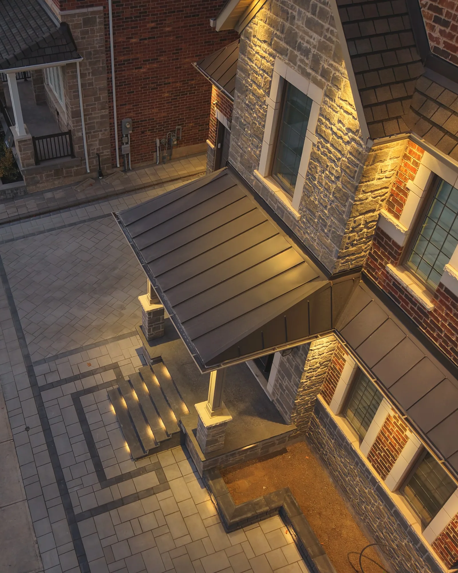 Angled view of the interlocking walkway, entrance steps and dark border detail